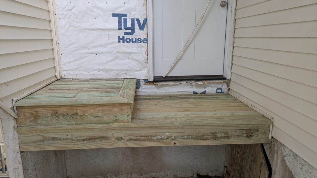 New stair tower deck door flashing